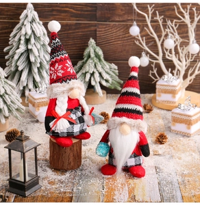 Christmas couple gnomes with knitted hats and plaid outfits in a cozy holiday scene
