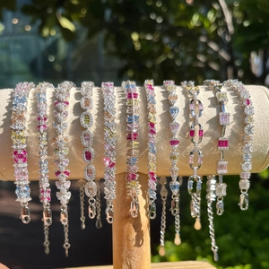 Elegant S925 sterling silver bracelets with colorful cubic zirconia in outdoor natural light