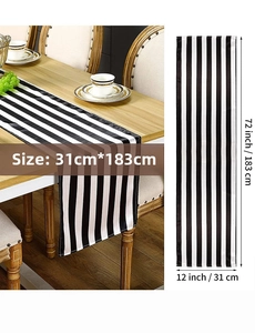 Detail view of modern black and white striped table runner measuring 12x72 inches