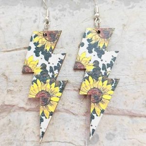 Lightning bolt wooden earrings with sunflower and cow patterns on metal hooks