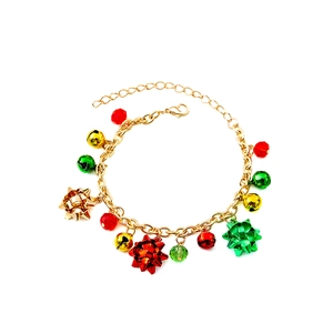 Christmas charm bracelet with red green beads and festive bell pendant on white background