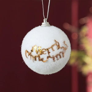 White flocked Christmas ball with gold Merry Christmas text and plush texture hanging ornament