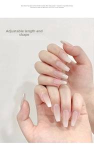 Macro shot of ultra-thin matte French gradient coffin fake nails with seamless finish