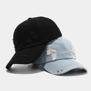 Vintage denim baseball caps with distressed holes and metal rings in black and light blue