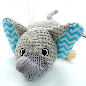 Detailed close-up of grey elephant plush dog toy with textured corn fleece and mesh details
