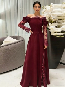 Elegant off-shoulder burgundy gown with floral lace sleeves and side slit detail