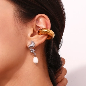 Chic 18K gold plated snake skin textured cuff and silver pearl drop earrings on model