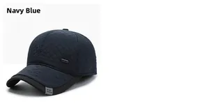 Detailed close-up of navy blue quilted baseball cap with grey brim and sport fashion tag