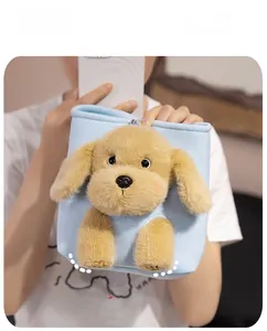 Light blue plush bucket bag with 3D golden retriever dog design held by a model