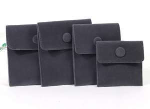 Deep grey velvet jewelry pouches with snap button in four varied sizes set