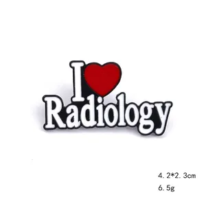 Enamel lapel pin with 'I Love Radiology' text and red heart on black background