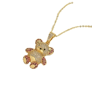 Elegant bear pendant necklace with red and white zircons on a gold-plated chain