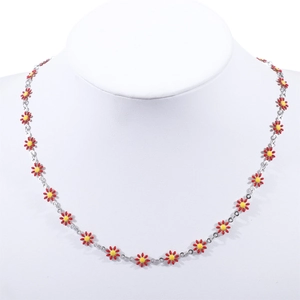 Detailed close-up of colorful enamel daisy necklace on a white bust jewelry display