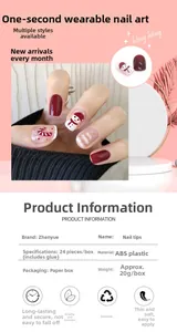 Close-up of red festive press-on nails with cute snowman and Christmas tree designs