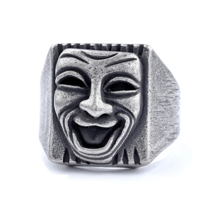 Vintage oxidized silver comedy mask ring with a punk style dramatic face relief design
