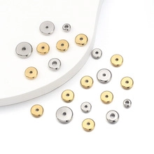 Macro shot of gold and silver hollow metal spacer beads for DIY jewelry making