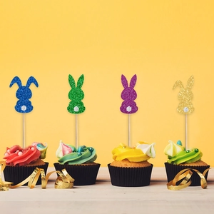 Glittery Easter bunny cupcake toppers in blue, green, purple, and gold with fuzzy tails