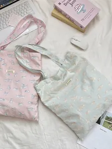 Cute cat print canvas tote bag with large capacity, ideal for students and summer travel