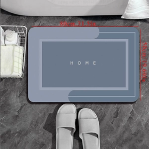 Modern diatomaceous earth bath mat with HOME text in gray blue, 80x50cm non-slip design