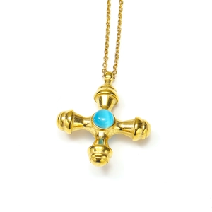 Detail of 18k gold cross pendant with an inlaid blue natural stone on a thin chain