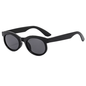 Vintage oval black sunglasses with thick frames and dark grey lenses for men and women