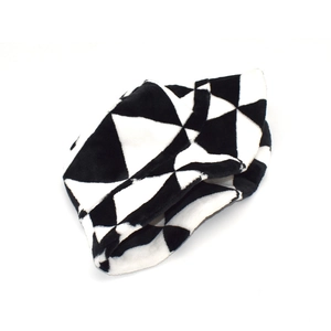 Women's plush bucket hat featuring a geometric black and white color block pattern