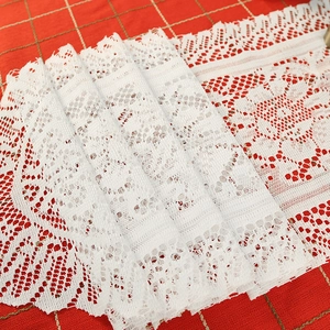 Vintage white floral lace table runner with hollow patterns and elegant tassels