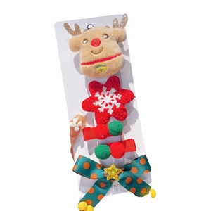 Christmas hair clip set featuring plush reindeer, snowflake flowers and bows for girls