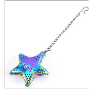 Close-up of rainbow stainless steel star tea infuser with smiling face and chain