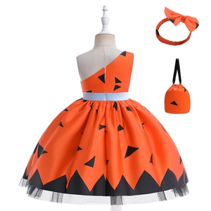 Detail view of girl Halloween pumpkin witch dress with headband and matching pouch