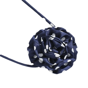 Long navy blue chiffon choker necklace with white polka dots and large rose flower detail
