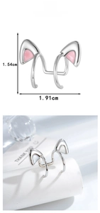 Detailed view of pink enamel cat ear cuff with dimensions 1.54cm height and 1.91cm width
