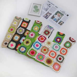 Handmade granny square crochet tote bags in various colors with bohemian floral patterns