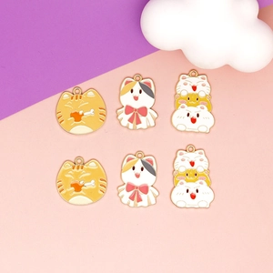 DIY cat enamel charms set featuring orange and calico designs for jewelry making