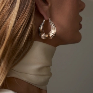 Polished 18k gold plated stainless steel chunky earrings with elegant fluid texture