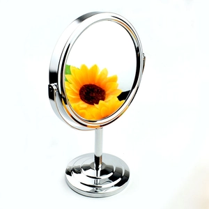 Silver metal desktop makeup mirror with a round double-sided swivel and sunflower reflection