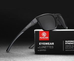 Detailed close-up of polarized square frame sunglasses on branded KDEAM packaging box