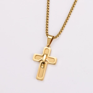 Close-up of golden stainless steel cross pendant with double-layer design on box chain