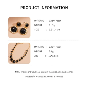 Detail view of retro geometric resin bead necklace and matching earrings in alloy