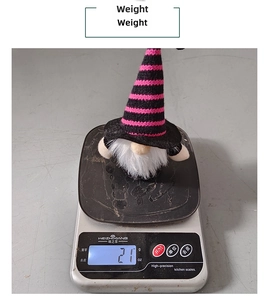 Weight display of 21g for the miniature Halloween gnome ornament on an electronic scale