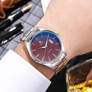 Men's quartz watch with silver steel band and red dial featuring date display