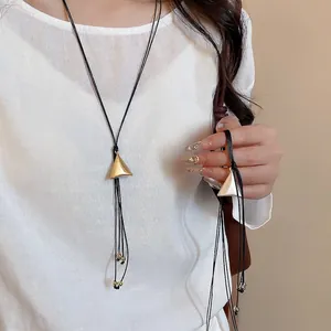 Minimalist double-layered triangular cone pendant necklace with leather cord in gold and silver