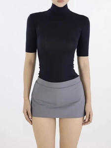 Chic grey A-line mini skirt with black high-neck top for a trendy aesthetic look