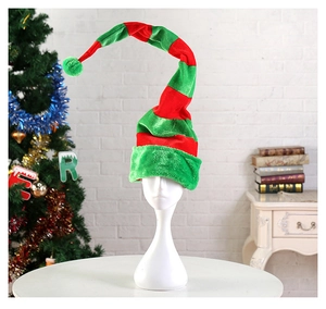 Detailed view of a red and green striped Christmas elf hat with a soft green pom-pom top