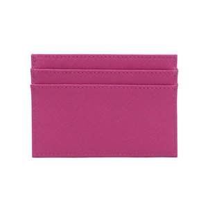 Detail showing the layered card slots and cross-grain leather texture in rose red
