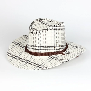 Close-up of wide brim straw cowboy hat with black grid weave and brown rope trim