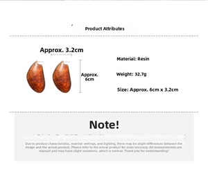 Boucles d'oreilles irrégulières en résine ambrée, dimensions 6cm x 3,2cm et poids 32,7g