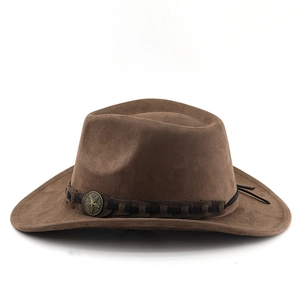 Detail of a dark brown suede cowboy hat with black braided band and vintage bronze star