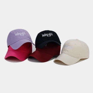 Detail of babygirl gothic embroidery on various colors of cotton canvas baseball caps