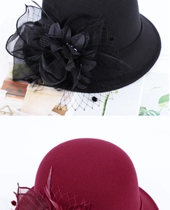 Detail of wool felt fascinator hat featuring vintage mesh veil and fabric floral accents